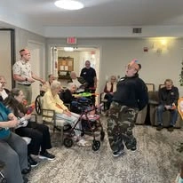 Avamere at Sandy senior living community offering assisted living, memory care, and respite care in Sandy, OR, residents enjoying an entertaining play