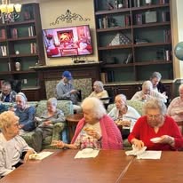 seniors eating treats at a party
