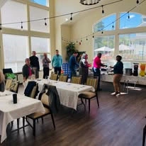 Azalea Estates Gracious Retirement Living Hawthorn Senior Independent Living in Chapel Hill, North Carolina residents getting food