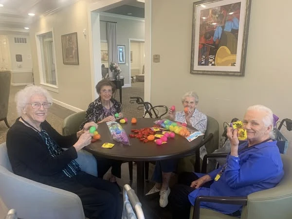 The Lodge at Pine Creek residents feeling festive and stuffing easter eggs