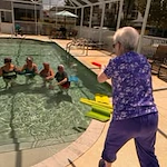 alishan Gracious Retirement Living Hawthorn Senior Independent Living in Spring Hill, Florida residents in the pool