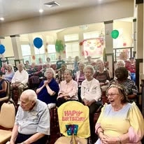 Willow Creek Gracious Retirement Living Hawthorn Senior Independent Living in Chesapeake, Virginia residents attending a birthday party