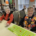 The Highlands Gracious Retirement Living Hawthorn Senior Independent Living in Westborough, Massachusetts residents playing bingo