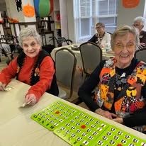 The Highlands Gracious Retirement Living Hawthorn Senior Independent Living in Westborough, Massachusetts residents playing bingo