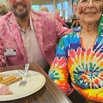 Wenatchee Senior Living by Cogir senior living community offering independent living, assisted living, and respite care in Wenatchee, WA, smiling resident in a tie dye shirt