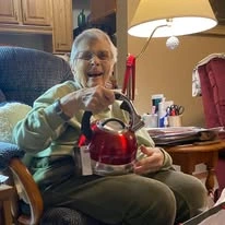 Ascension Living Via Christi Village Georgetown Senior Independent Living in Wichita, Kansas resident holding a tea pot