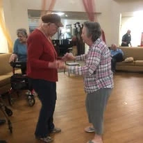 Pioneer Valley Lodge Gracious Retirement Living Hawthorn Senior Independent Living in North Logan, Utah residents dancing