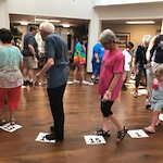 Colonial Harbor Gracious Retirement Living Hawthorn Senior Independent Living in Yorktown, Virginia residents playing a game