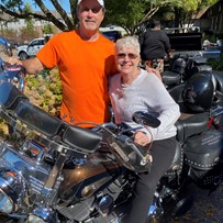 American House Stone Independent Senior Living in Rochester Hills, MI resident sitting on a motorcycle