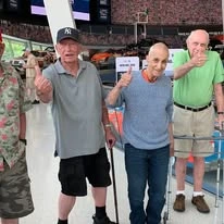 Ashton Gardens Gracious Retirement Living Hawthorn Senior Living Community in Portland, Maine residents giving thumbs up