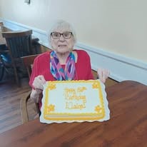 Ascension Living Via Christi Village Ponca City Senior Living in Ponca City, Oklahoma resident with birthday cake