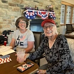 Noel Manor Retirement Living Verona, WI, smiling resident during a celebration