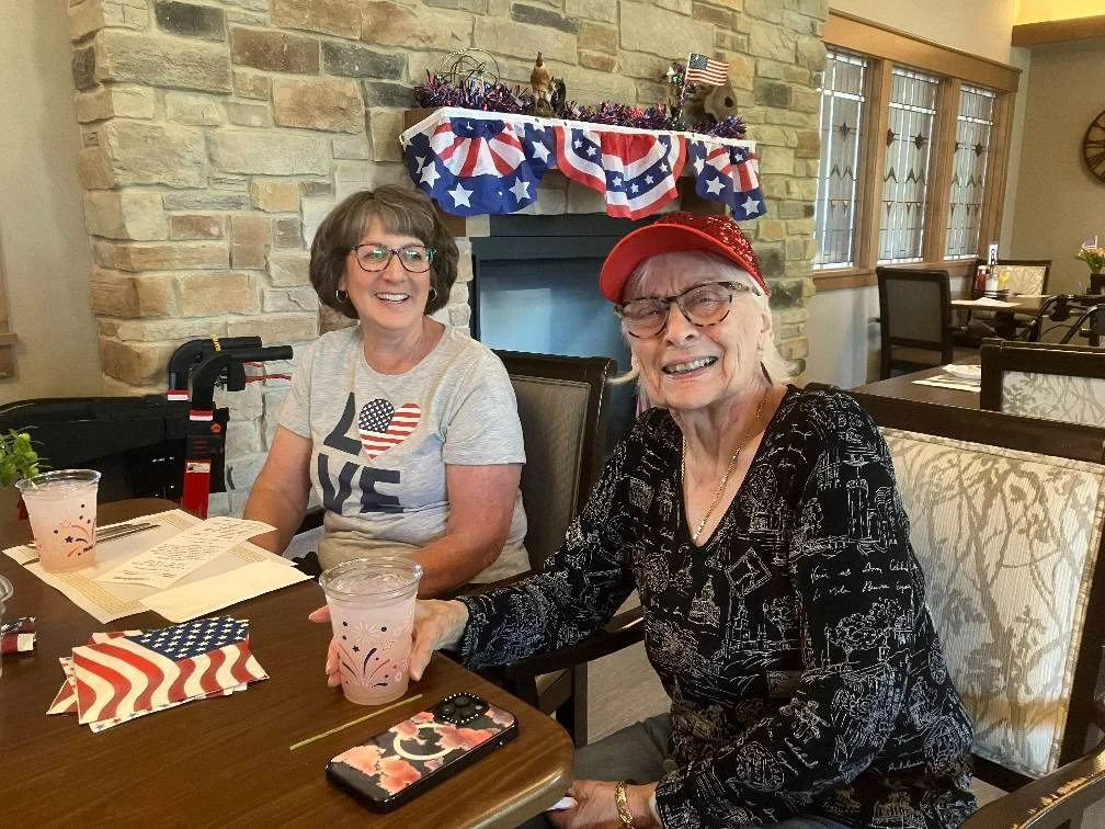 Noel Manor Retirement Living Verona, WI, smiling resident during a celebration
