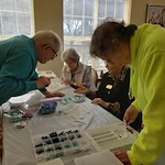 Maple Ridge Gracious Retirement Living Hawthorn Senior Independent Living in Cedar Park, Texas residents doing arts and crafts