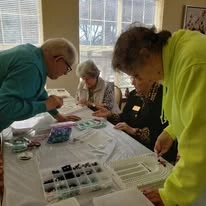 Maple Ridge Gracious Retirement Living Hawthorn Senior Independent Living in Cedar Park, Texas residents doing arts and crafts