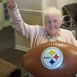 Hawthorne Woods by New Perspective in Washington, PA, happy resident ready to cheer during a football game