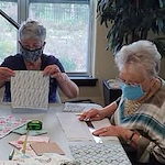 Providence Meadows Gracious Retirement Living Hawthorn Senior Independent Living in Charlotte, North Carolina residents doing arts and crafts