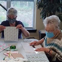 Providence Meadows Gracious Retirement Living Hawthorn Senior Independent Living in Charlotte, North Carolina residents doing arts and crafts