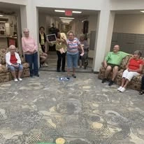 Steeplechase Gracious Retirement Living Hawthorn Senior Independent Living in Oxford, Florida residents playing a game