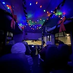 Gaines Park residents taking a bus to go to a Christmas light viewing