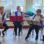 Northridge Gracious Retirement Living Hawthorn Senior Independent Living in Fishers, Indiana residents playing instruments