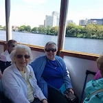 Kennedy Meadows Gracious Retirement Living Hawthorn Senior Independent Living in North Billerica, Massachusetts residents on a boat tour
