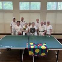 Cypress Springs Gracious Retirement Living Hawthorn Senior Independent Living in Lakewood Ranch, Florida residents playing ping pong table tennis