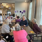 Calumet Trace - a Charter Senior Living Community residents enjoying playing games together