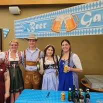 Wenatchee Senior Living by Cogir senior living community offering independent living, assisted living, and respite care in Wenatchee, WA, residents at a community German beer party