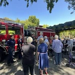 The Oaks of Pasadena residents enjoying a fire truck tour.