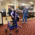 Estrella Estates Gracious Retirement Living Hawthorn Senior Independent Living in Goodyear, Arizona residents playing a competitive game