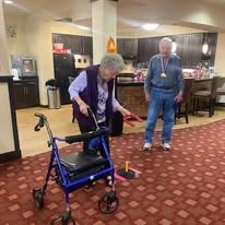Estrella Estates Gracious Retirement Living Hawthorn Senior Independent Living in Goodyear, Arizona residents playing a competitive game