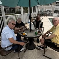 alishan Gracious Retirement Living Hawthorn Senior Independent Living in Spring Hill, Florida residents eating outside