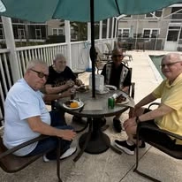 alishan Gracious Retirement Living Hawthorn Senior Independent Living in Spring Hill, Florida residents eating outside