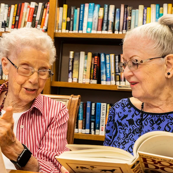 Rosewood Senior Living in Bakersfield, CA, residents in the library