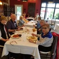 Kennedy Meadows Gracious Retirement Living Hawthorn Senior Independent Living in North Billerica, Massachusetts residents eating at a restaurant