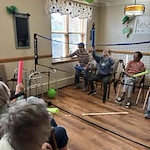 residents at St Mary’s Manor Assisted Living in South Milwaukee, Wisconsin playing balloon volleyball