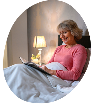 a senior reading while winding down for bed