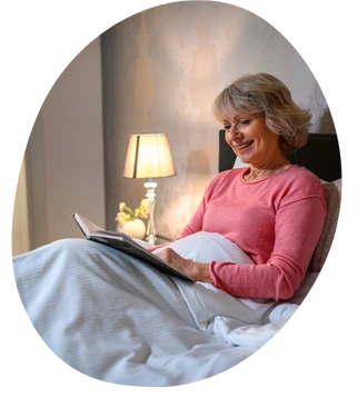 a senior reading while winding down for bed