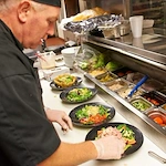 John Knox Village Senior Living CCRC near Kansas City, MO chef preparing food