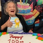Harvester Place Senior Assisted Living Memory Care in Burr Ridge, IL resident celebrating her 100th birthday