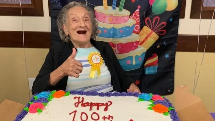 Harvester Place Senior Assisted Living Memory Care in Burr Ridge, IL resident celebrating her 100th birthday