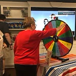 Colonial Harbor Gracious Retirement Living Hawthorn Senior Independent Living in Yorktown, Virginia resident playing a game