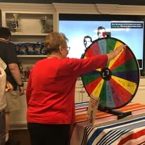 Colonial Harbor Gracious Retirement Living Hawthorn Senior Independent Living in Yorktown, Virginia resident playing a game