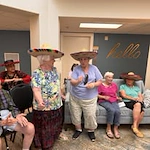 alishan Gracious Retirement Living Hawthorn Senior Independent Living in Spring Hill, Florida residents wearing sombreros