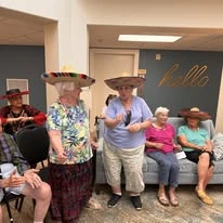 alishan Gracious Retirement Living Hawthorn Senior Independent Living in Spring Hill, Florida residents wearing sombreros