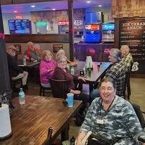 Avamere at St. Helens senior living community offering independent living, assisted living, memory care, and respite care in St. Helens, OR, residents out to eat at a restaurant