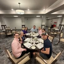 Belmont Gardens Gracious Retirement Living Hawthorn Senior Independent Living in Woodbridge, Virginia resident and family in the dining room