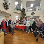 Pioneer Valley Lodge Gracious Retirement Living Hawthorn Senior Independent Living in North Logan, Utah residents at a Christmas party