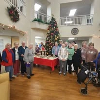 Pioneer Valley Lodge Gracious Retirement Living Hawthorn Senior Independent Living in North Logan, Utah residents at a Christmas party